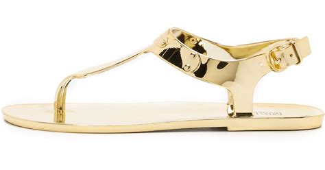 michael michael kors mk plate jelly sandal gold|Michael Kors jelly thong sandals.